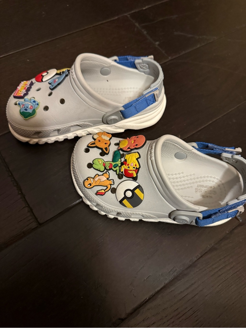 Kids White Slip-On Crocks with Blue Strap and Colorful Charms